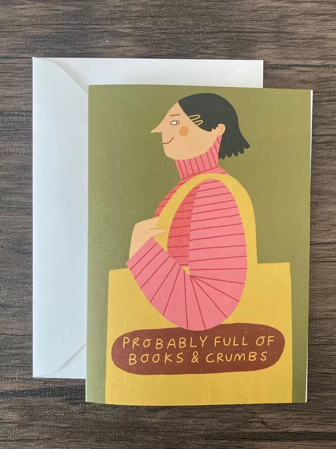 Books and crumbs greetings card by Skeleton draw