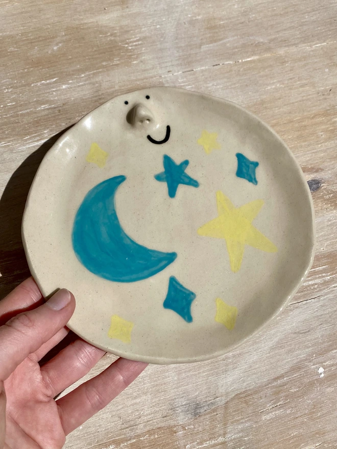 ceramic starry sky side plate - held - angle