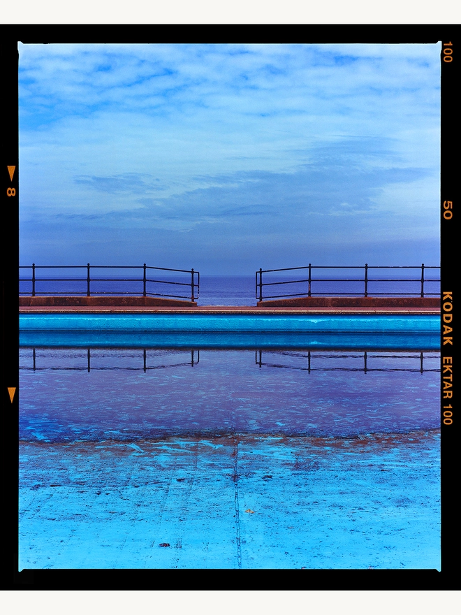 Craig y Don Pool blue symmetry pool sea artwork  