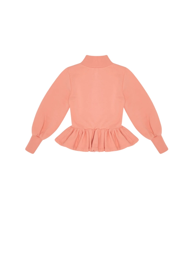 Top made from cotton with a brushed back sweat interior for cosy-ness. Rib detailing to neck and cuffs. Featuring a fully gathered peplum and balloon sleeves.