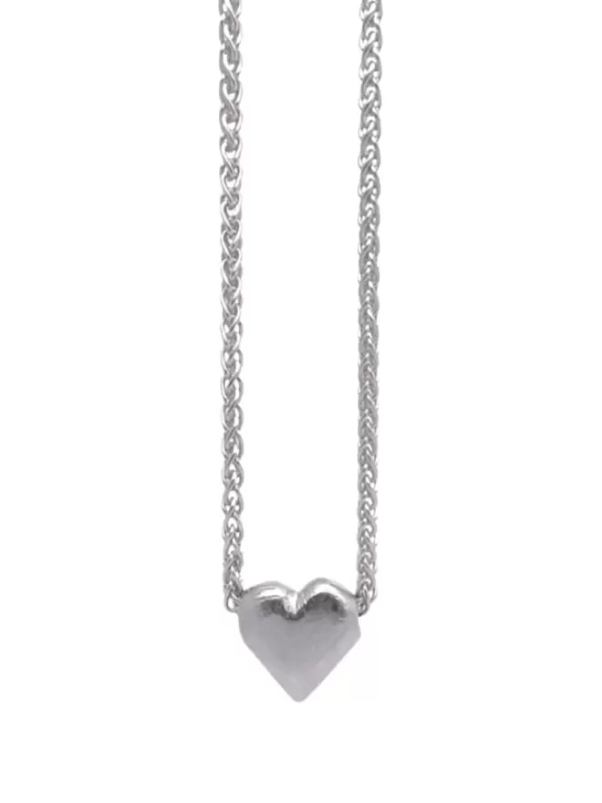 a silver love token pendant, solid sterling silver strung on a robust wheat chain
