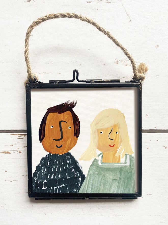 hand painted picture of man and lady in a frame