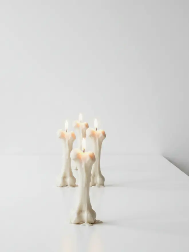 Table full of bone candles