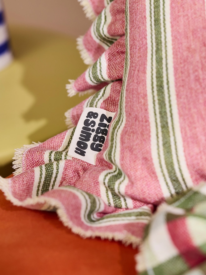Pink Sherbet Ruffle Cushion. Label detail.