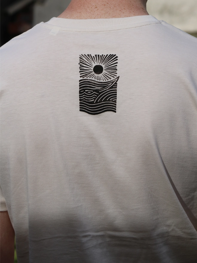 Male wearing a linocut t-shirt 