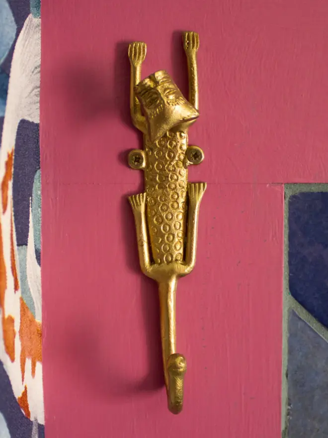 brass leopard hook on wall