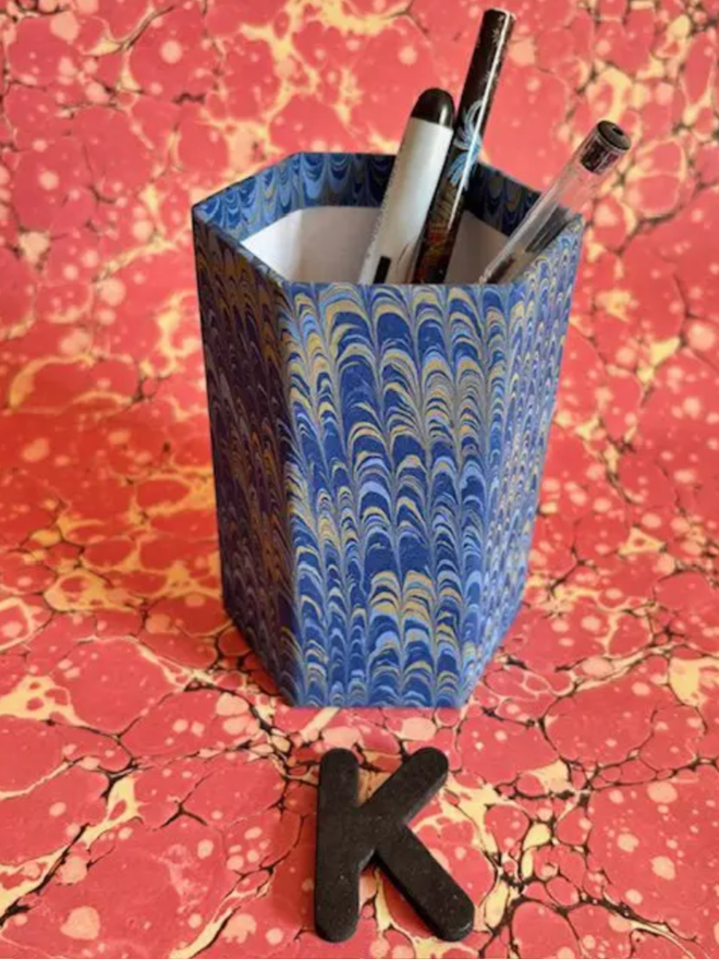 Pen Pot. A pen pot in K
