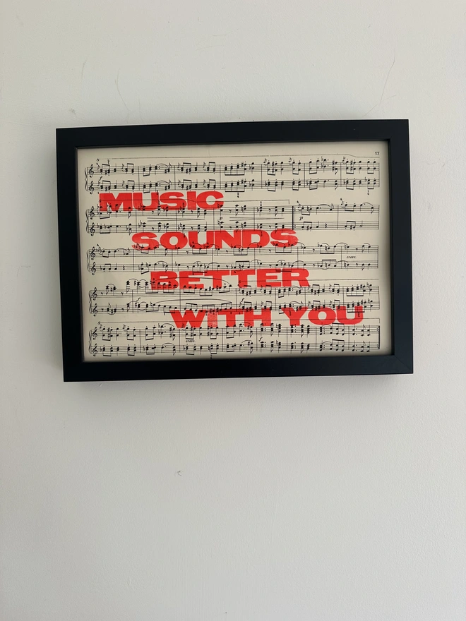Music Sounds Better With You letterpress print on sheet music framed one wall