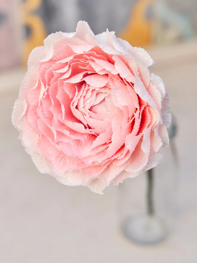 Tonal pink crepe paper flower