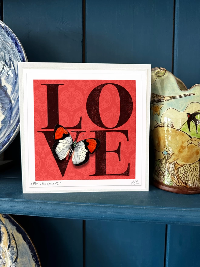 Red Love butterflygram displayed in home