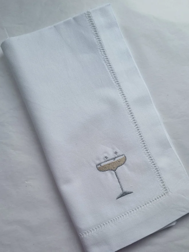 Embroidered champagne glass napkin