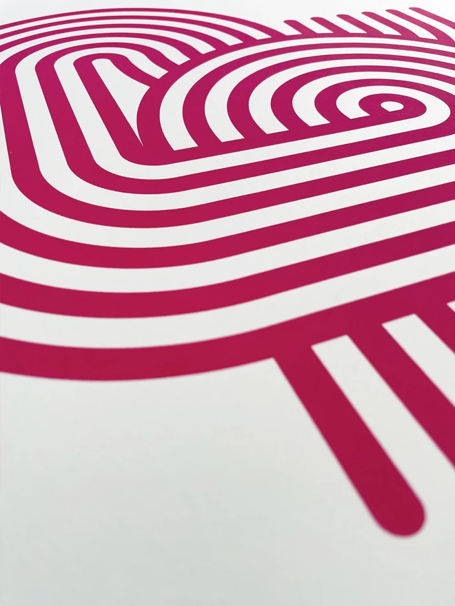 Close up of the stripy magenta heart screenprint design, parallel lines curve around to make a heart shape. Viewed from beneath looking up the image.