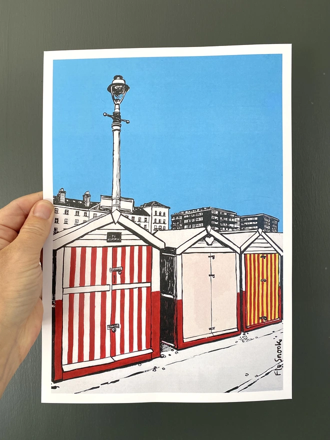 blue and red print of brighton hove beach huts