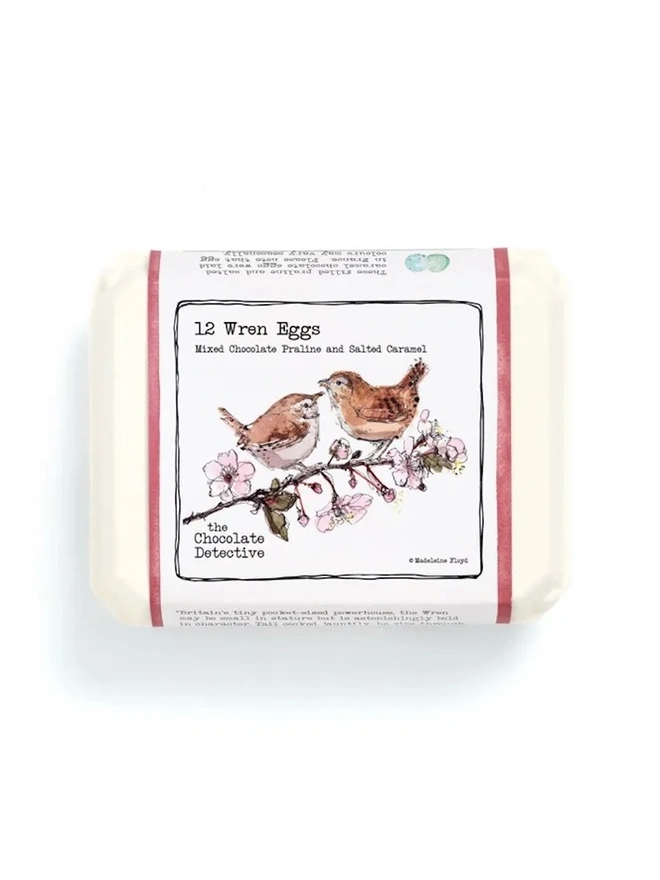Wren Eggs (Box Of 12), a box of chocolate wren eggs sitting on a white surface. 