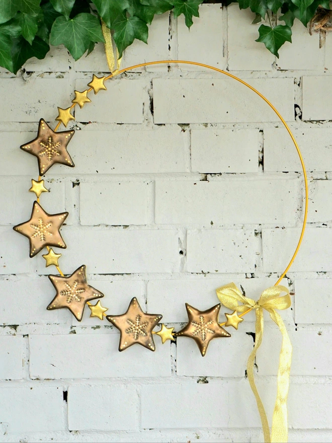 large ceramic christmas wreath, christmas star wreath, ceramic star wreath, gold star wreath, Christmas wreath, Jenny Hopps Pottery, Christmas decoration, christmas wall hanging