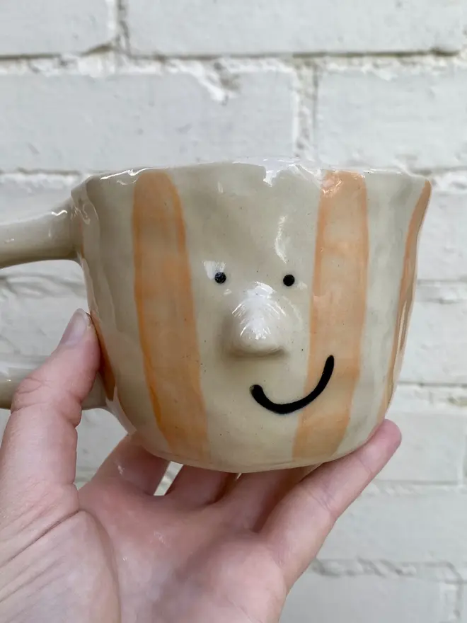 orange white stripe handmade ceramic smiley face mug