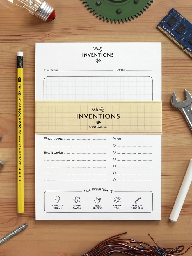 Odd Goose Daily Inventions Creative STEM Notepad seen top down with tools around it