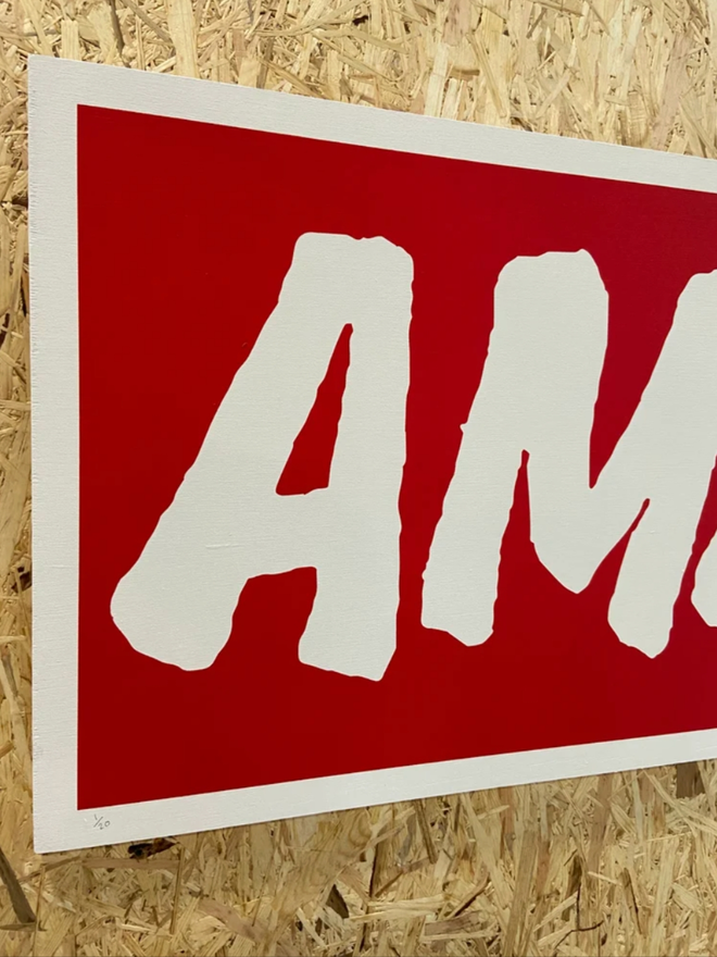 Very Big Amazing. Close up details of the print showing an A and M.