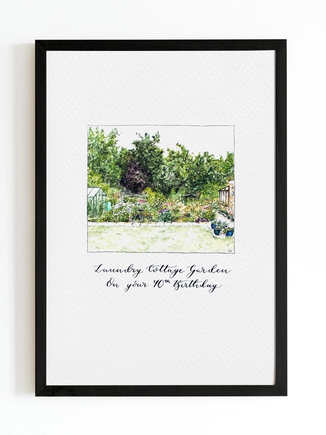 A black frame with white watercolour paper inside with a small intricately detailed illustration of a garden. There is black calligraphy hand lettering below that reads 'Laundry Cottage Garden On Your 90th Birthday'