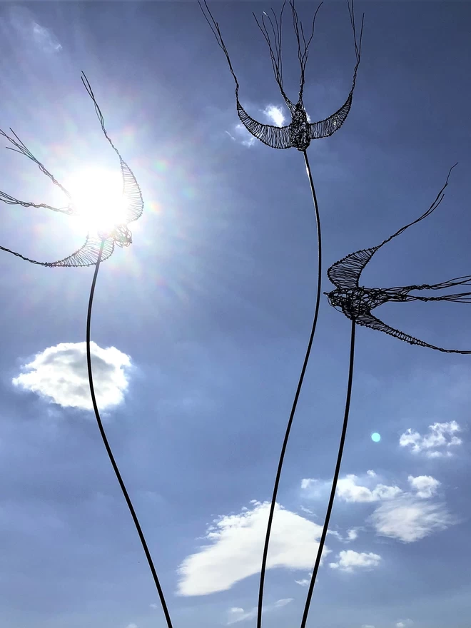 triple wire swallow garden sculpture