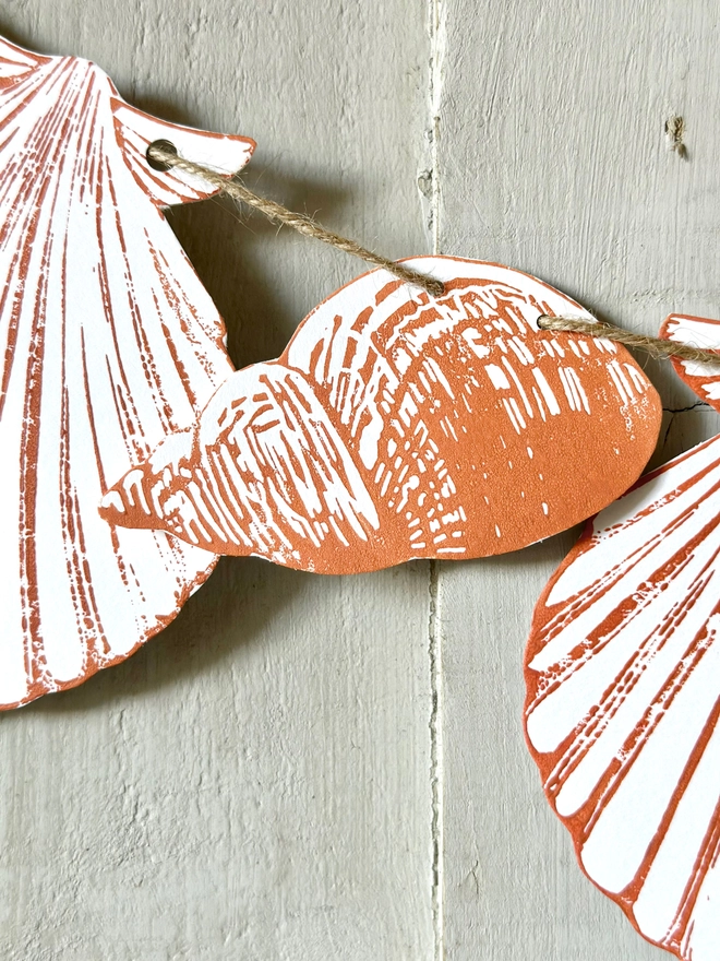 Sea Shell Garland. Hand Printed Linocut in Teracotta Ink