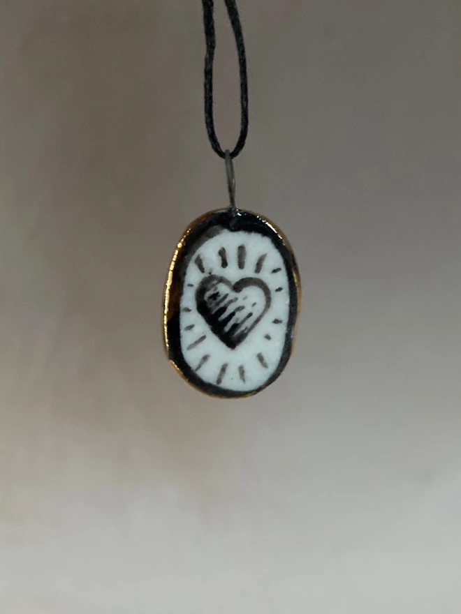 porcelain heart pendant hanging straight