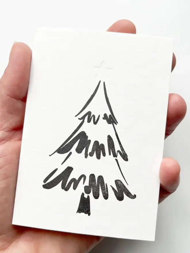 Letterpress Printed Christmas Tree Greeting Card. Black print on white background. 