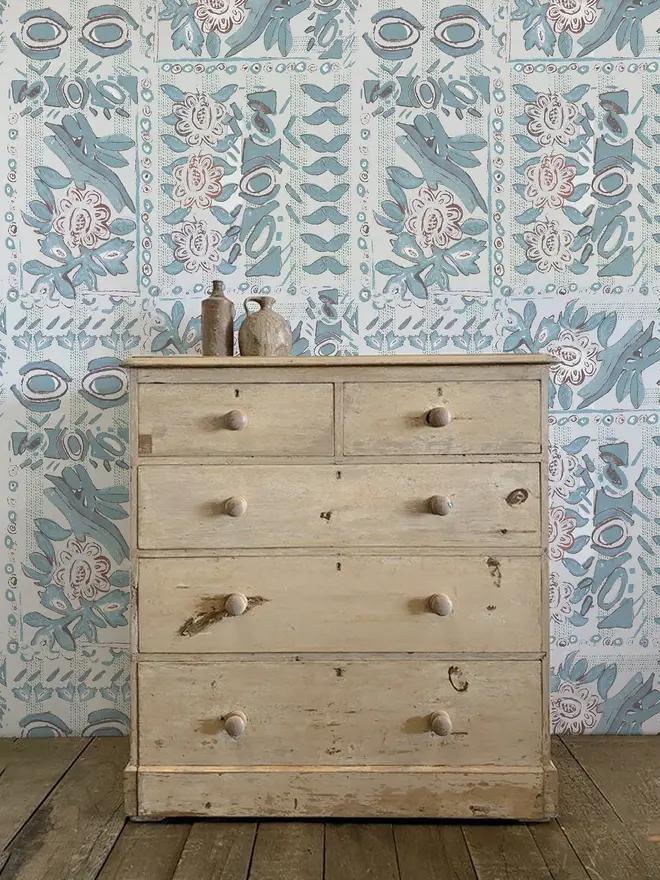 denim in venice illustrated wallpaper. a white background wallpaper with painted blue floral patterns.
