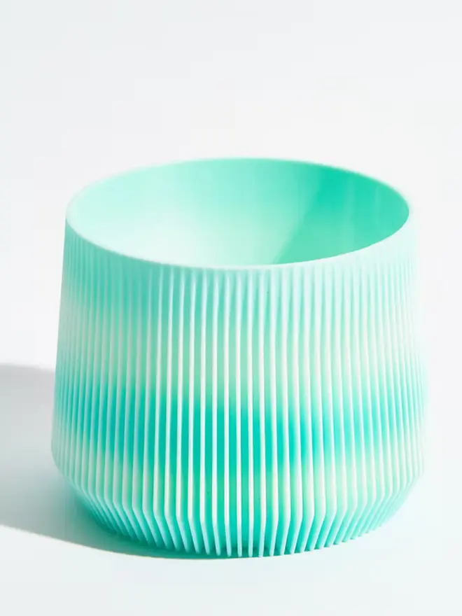 Sustainable 3D Printed Sky Blue Plant Pot, groovy design against a white background.