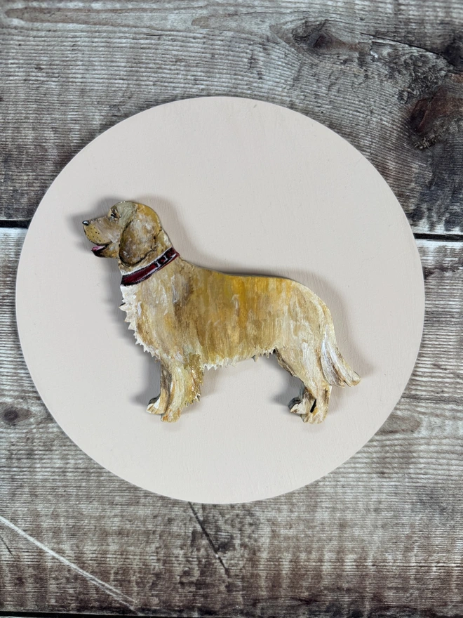 Hand Painted Golden Retriever Dog  Portrait mounted onto a circular wooden background also handpainted in pale pink 