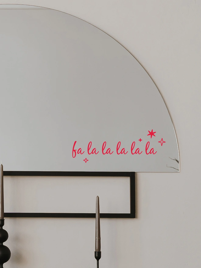 falalalala vinyl mirror sticker applied to a mirror in a hallway mirror