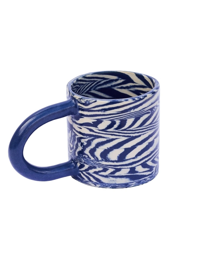 Herringbone Chunky Mug, a colourful mug sitting on a white surface against a plain backdrop. 