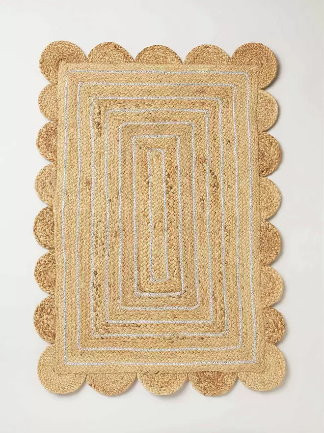 Jute doormat with scallop edge detail and thin silver detail woven in