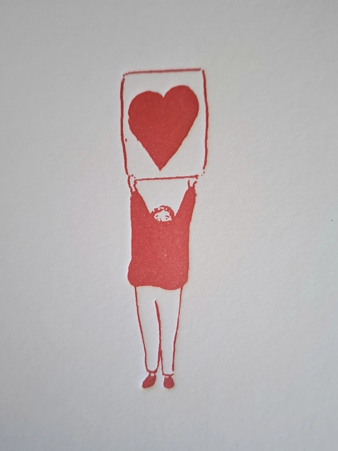 Heart Letterpress Handprinted Greetings Card, a white heart card with a red design. 