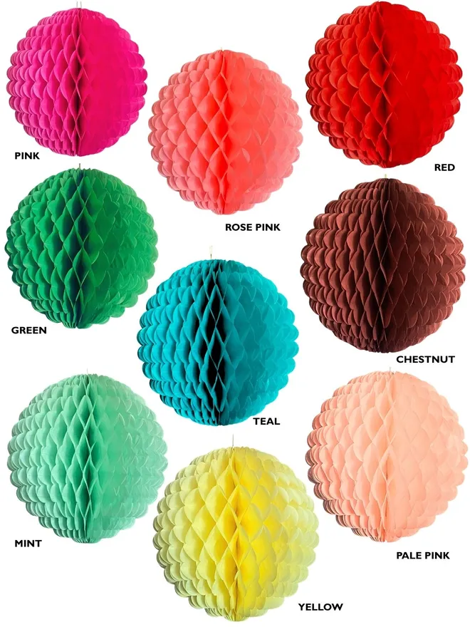 Honeycomb paper ball decorations on white background