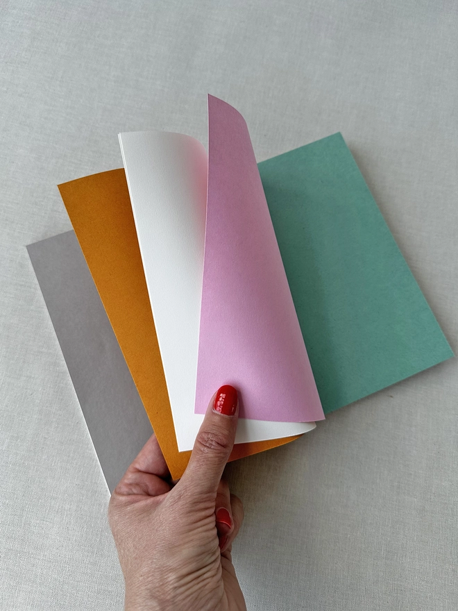 inside pages of marbled notebook