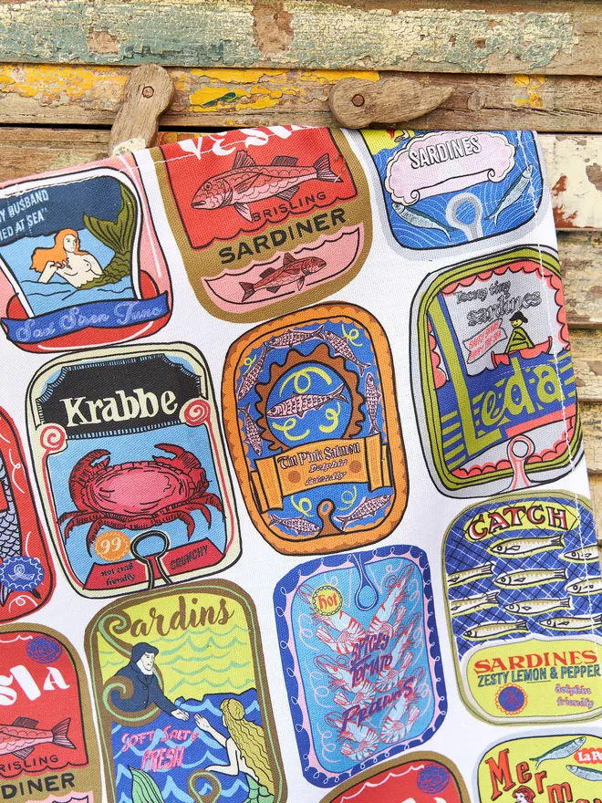 sardine tin design tea towel