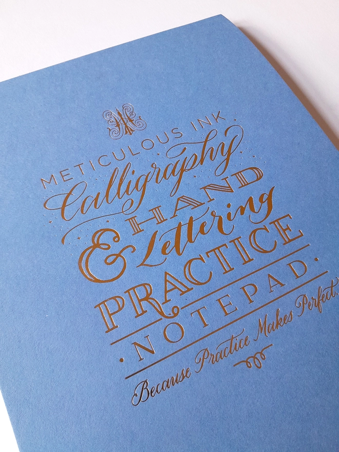 Meticulous Ink Calligraphy Practice Pad - Foil printed cover close up