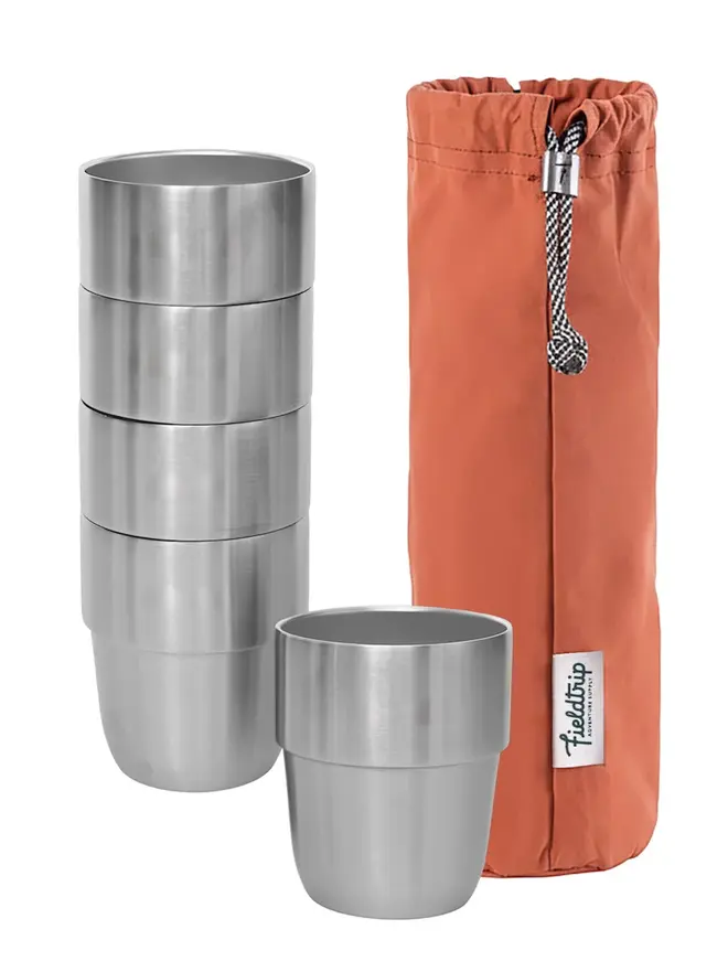 willow complete picnic hamper. a stack of stainless steel cups with an orange cloth bag.