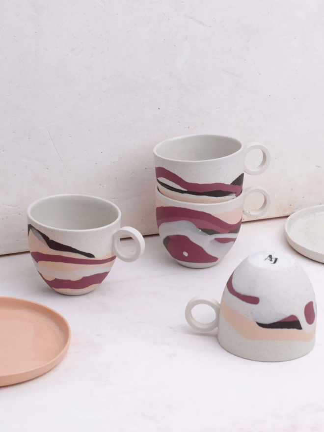 Dune Dreamlands Espresso Cup. A selection of cups from the Dune Dreamlands collection, showing typical variation in decoration.