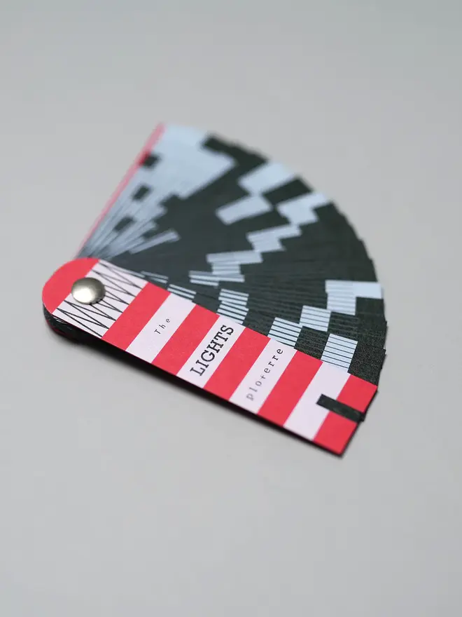 Lights Book, fanned out on table