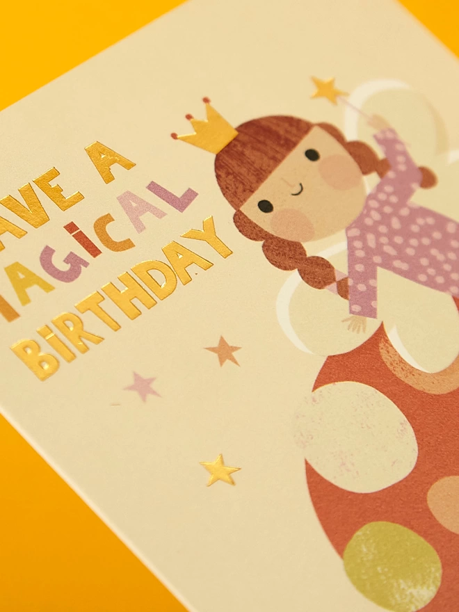 Detail image of the special gold foil details on the Raspberry Blossom children’s birthday card