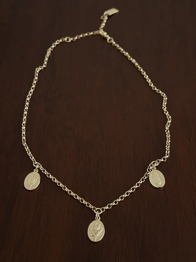 Gold Daughterhood Triple Charm Necklace