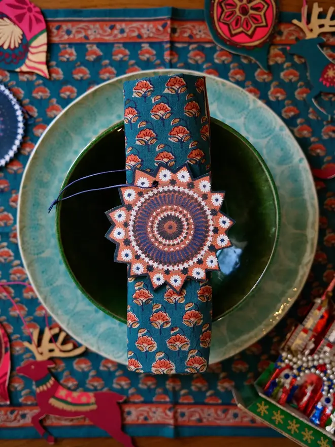 star wooden ornament on table