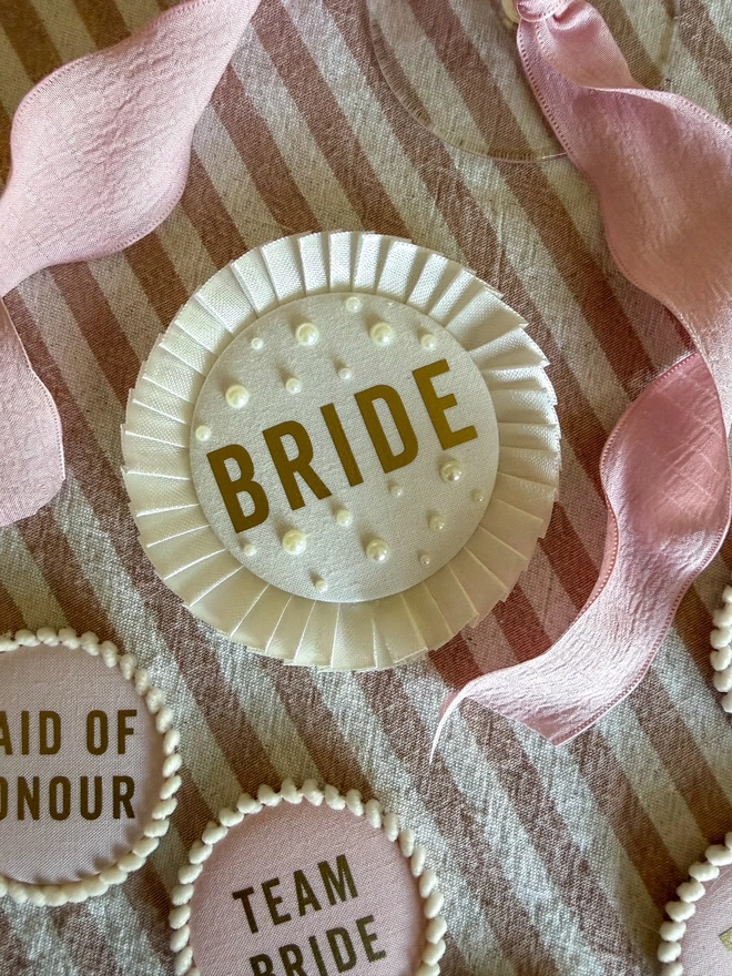 Cream/ Ivory Bride Badge with gold writing and a lace frill trim or pleated trim for hen party celebrations