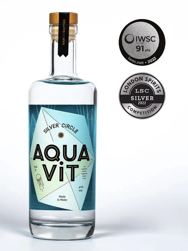 Silver Circle Aquavit, bottle of spirit on a white surface. 