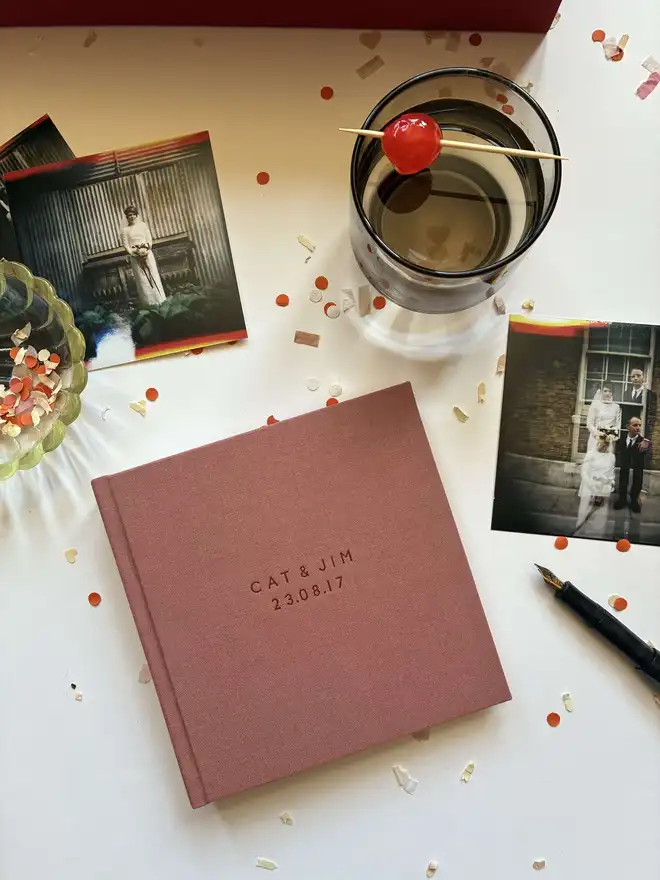 Small instant photo guestbook by Keep Collect with a single colour cover in Rose book cloth with accompanying cocktail 