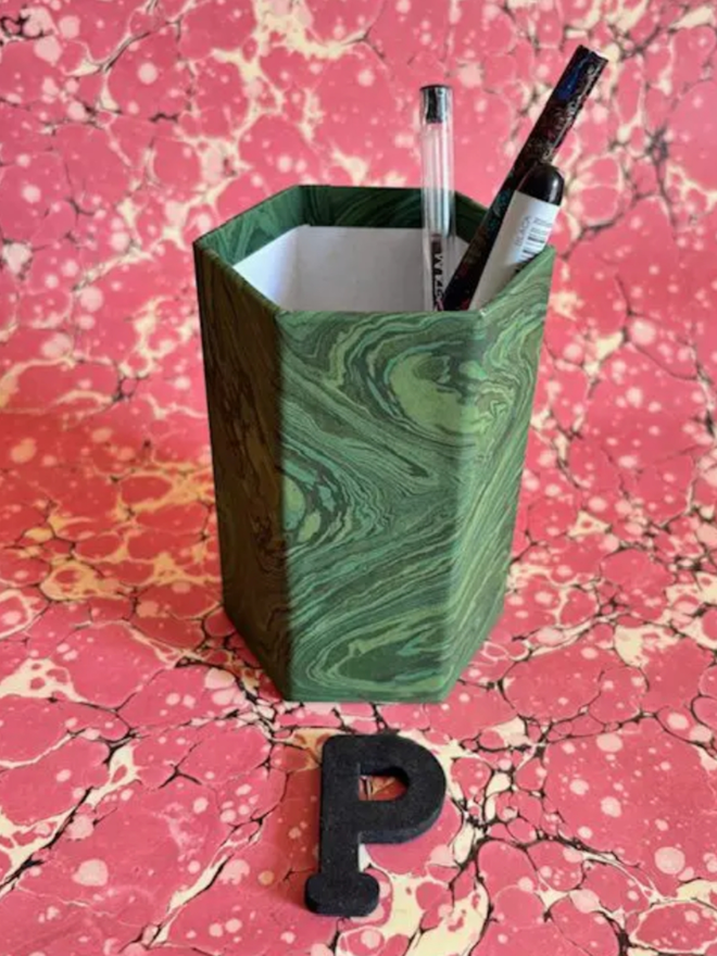 Pen Pot. A pen pot in P