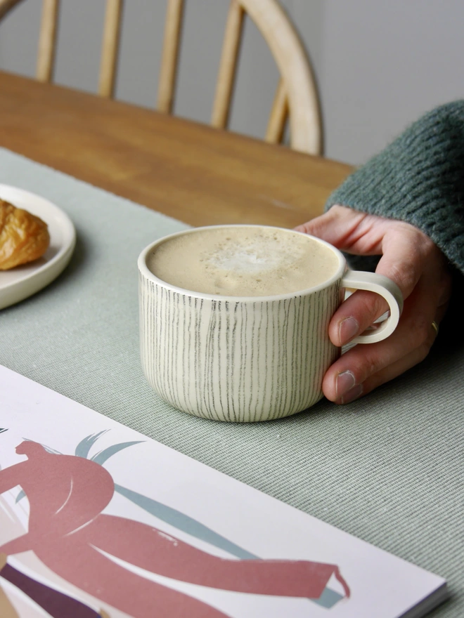 Small handmade striped mug