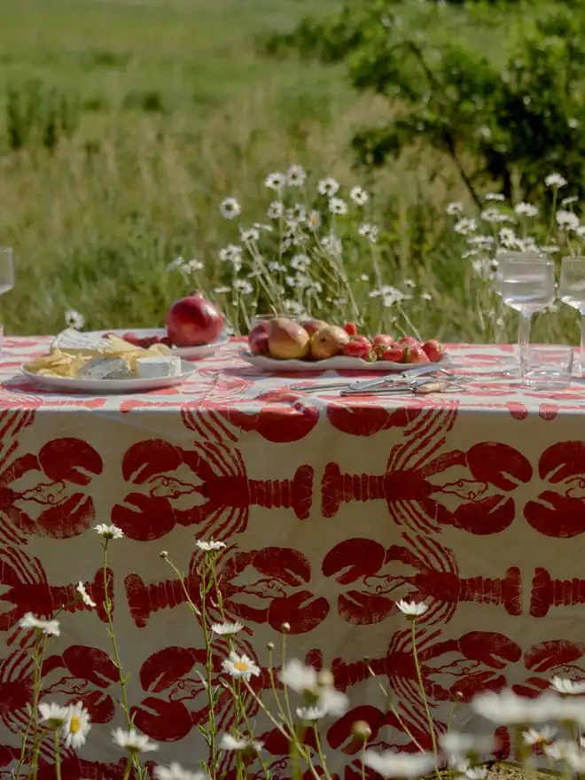 lobster tablecloth in a field 